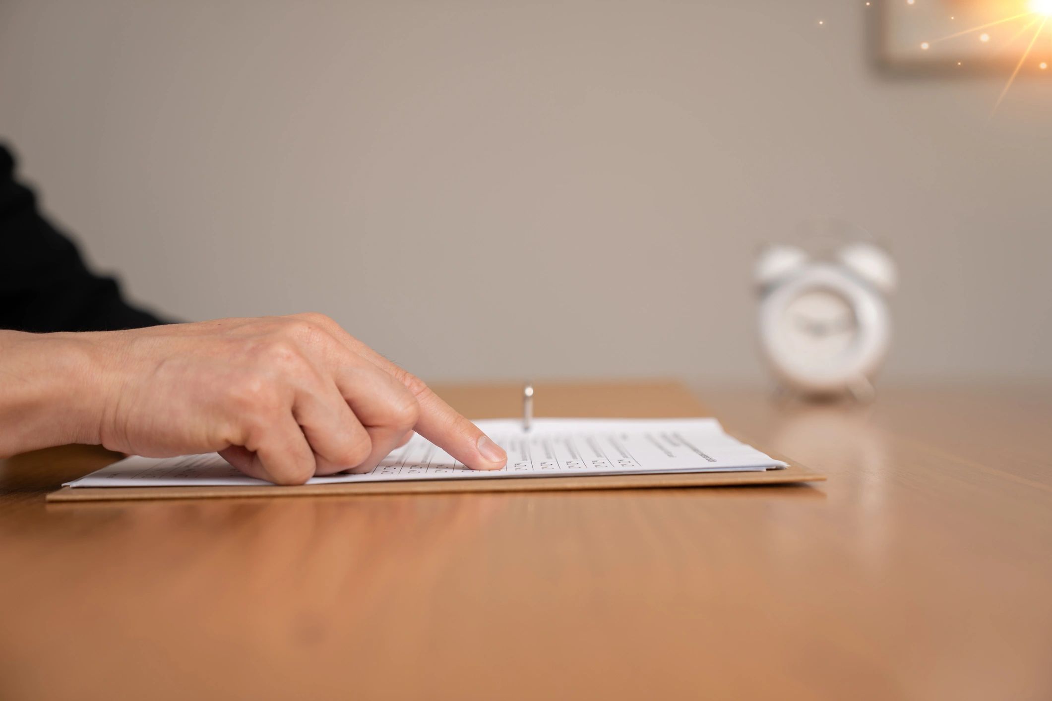 Close-up of a clipboard document representing SOP checklists and time management